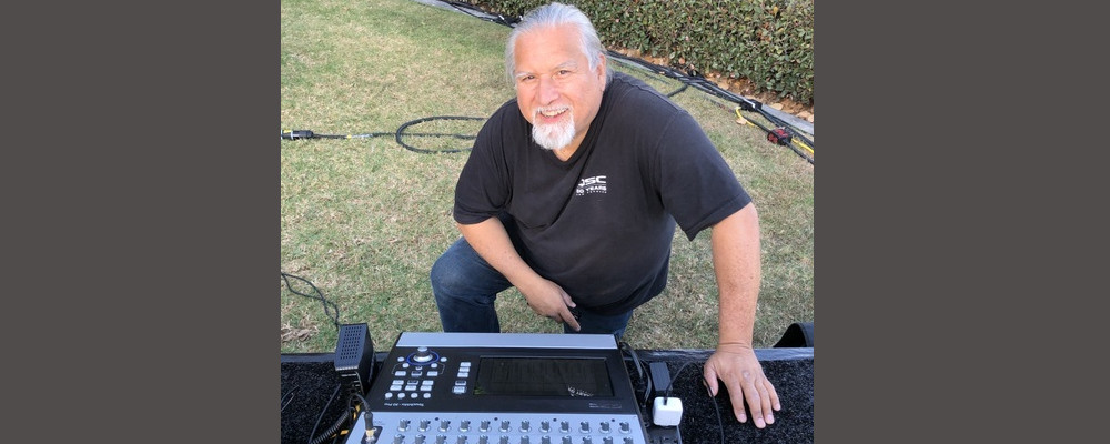 FOH ENGINEER LARRY SANCHEZ MIXES WITH QSC